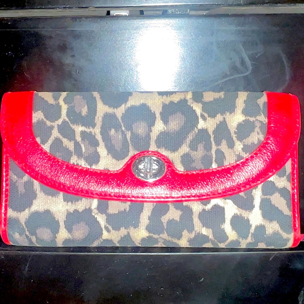 Used Coach trifold wallet